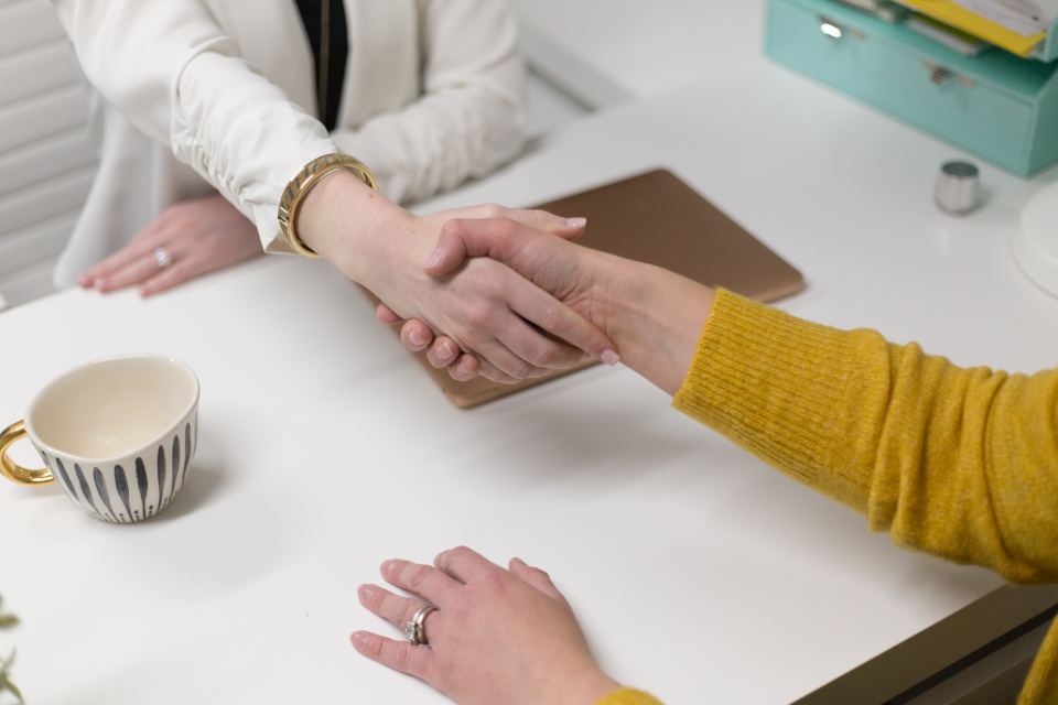 A handshake at the close of a consultation